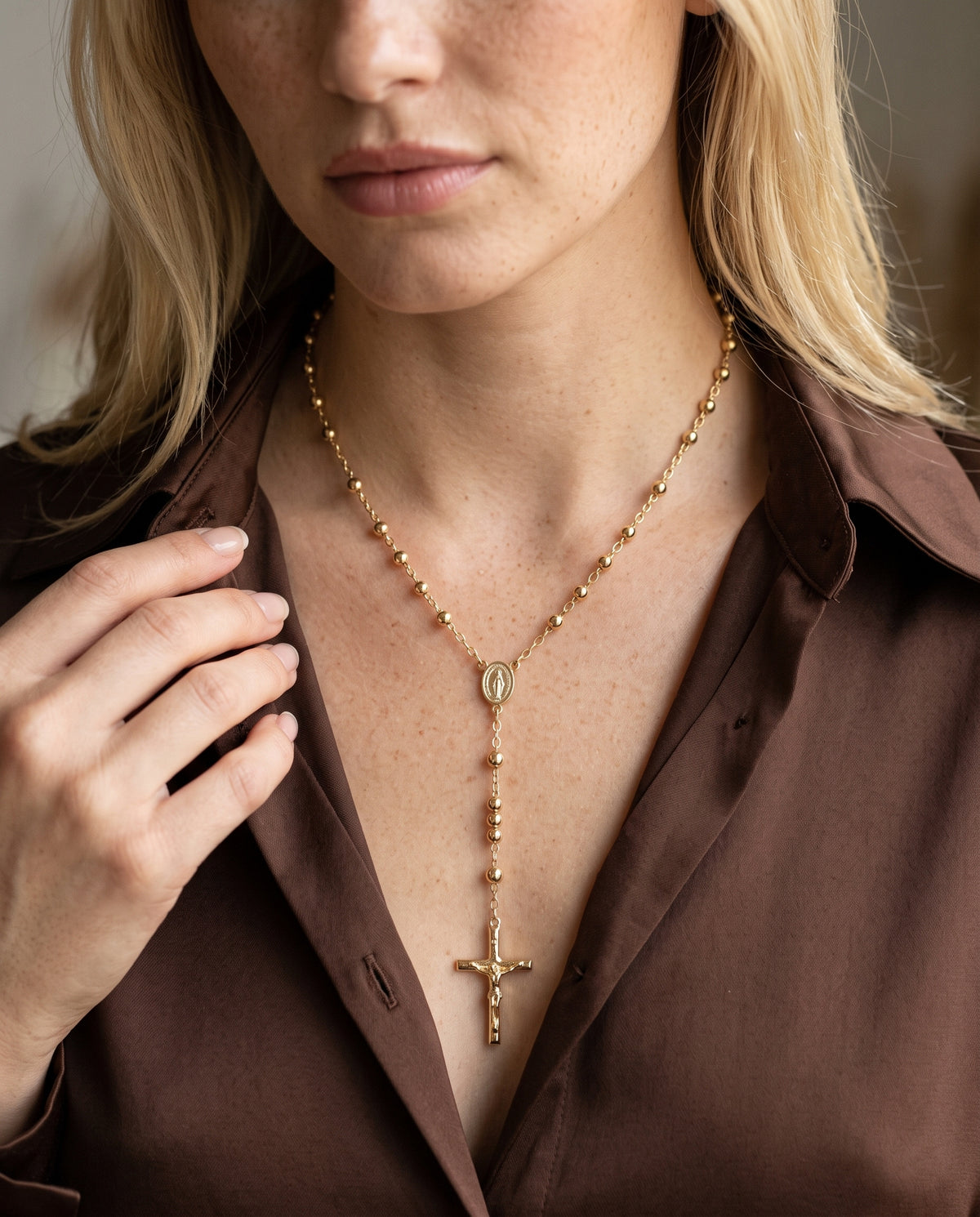 Gold Filled Virgin Mary Rosary Necklace worn by a model