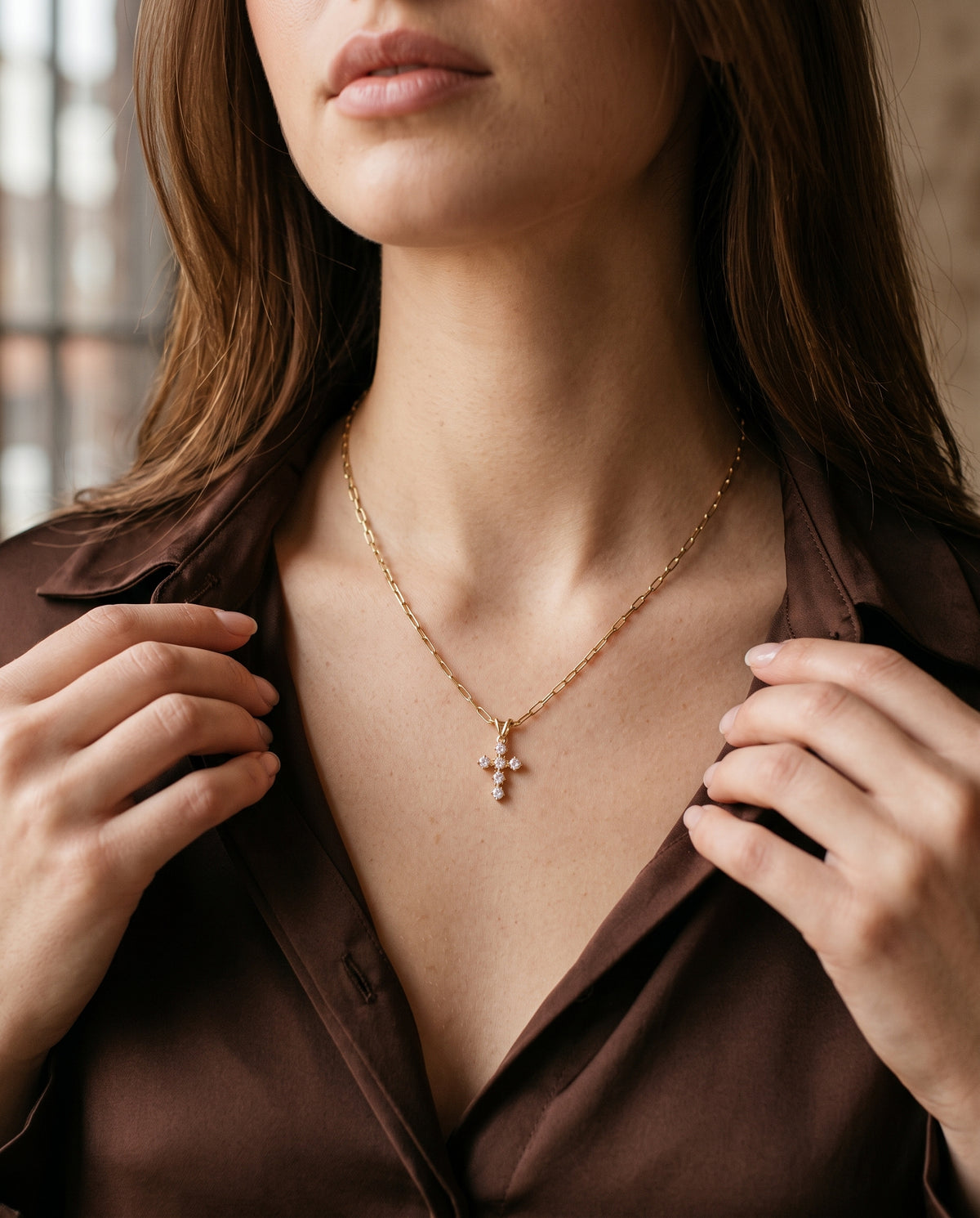 Mini CZ Cross Necklace worn by a model