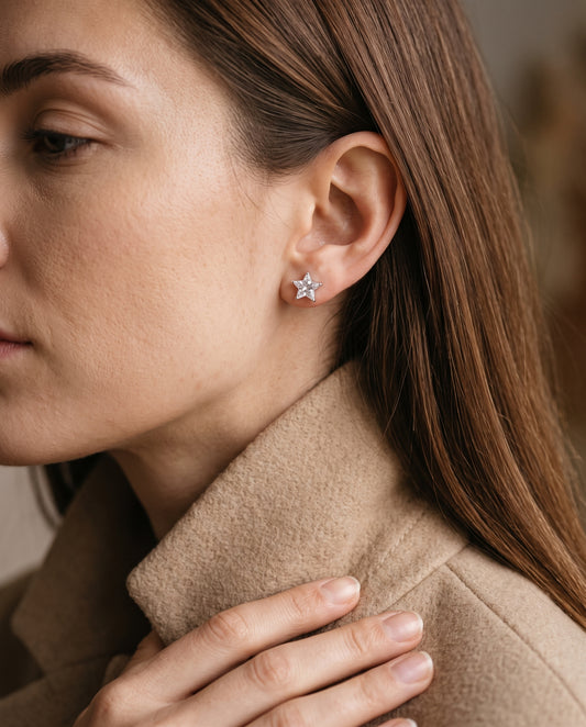 Sterling Silver 7mm CZ Star Studs worn by a model