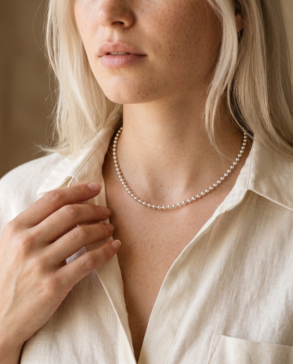 Sterling Silver Ball Necklace worn by a model