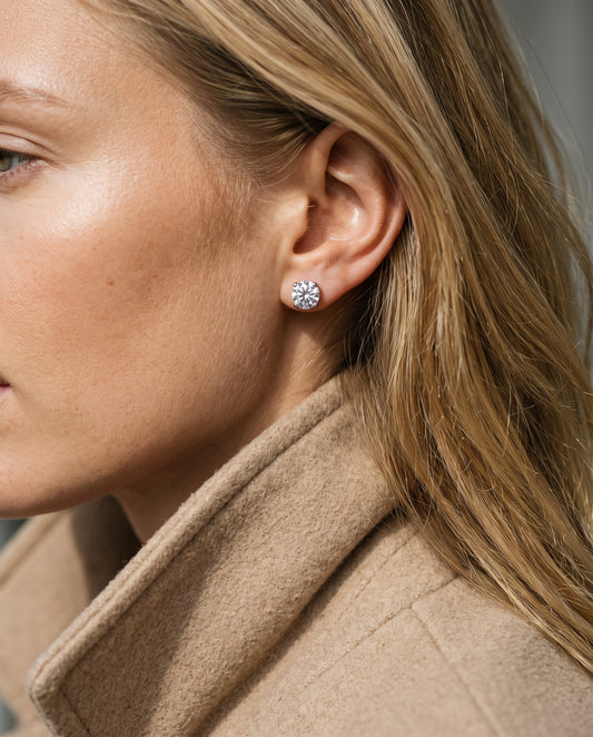 Sterling Silver CZ Stud Earrings worn by a model