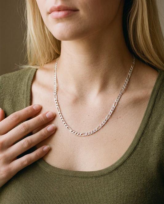 Sterling Silver Figaro Chain worn by a model