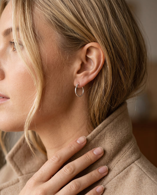 Sterling Silver Hoop Earrings worn by a model