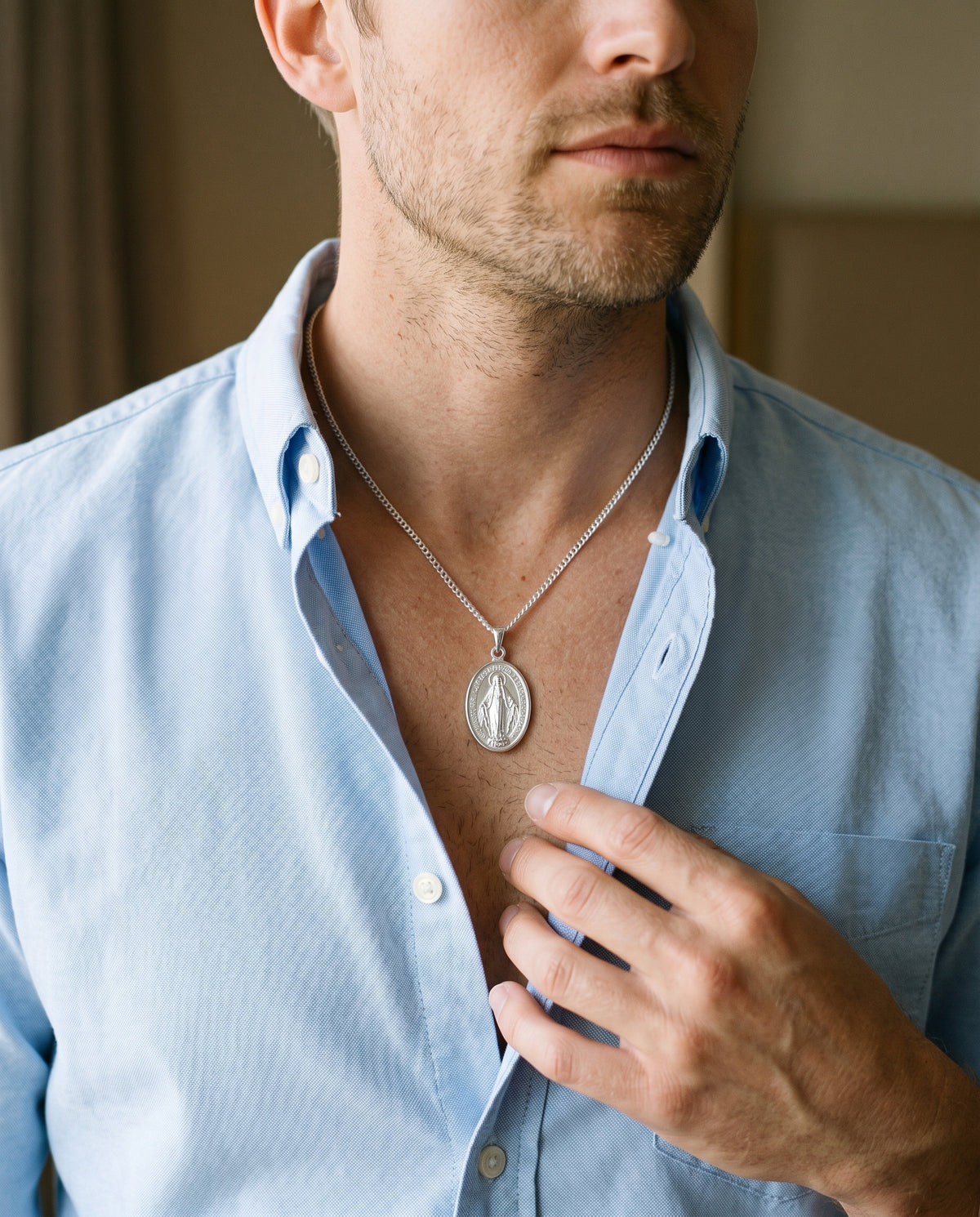 Sterling Silver Miraculous Medal Necklace worn by a model