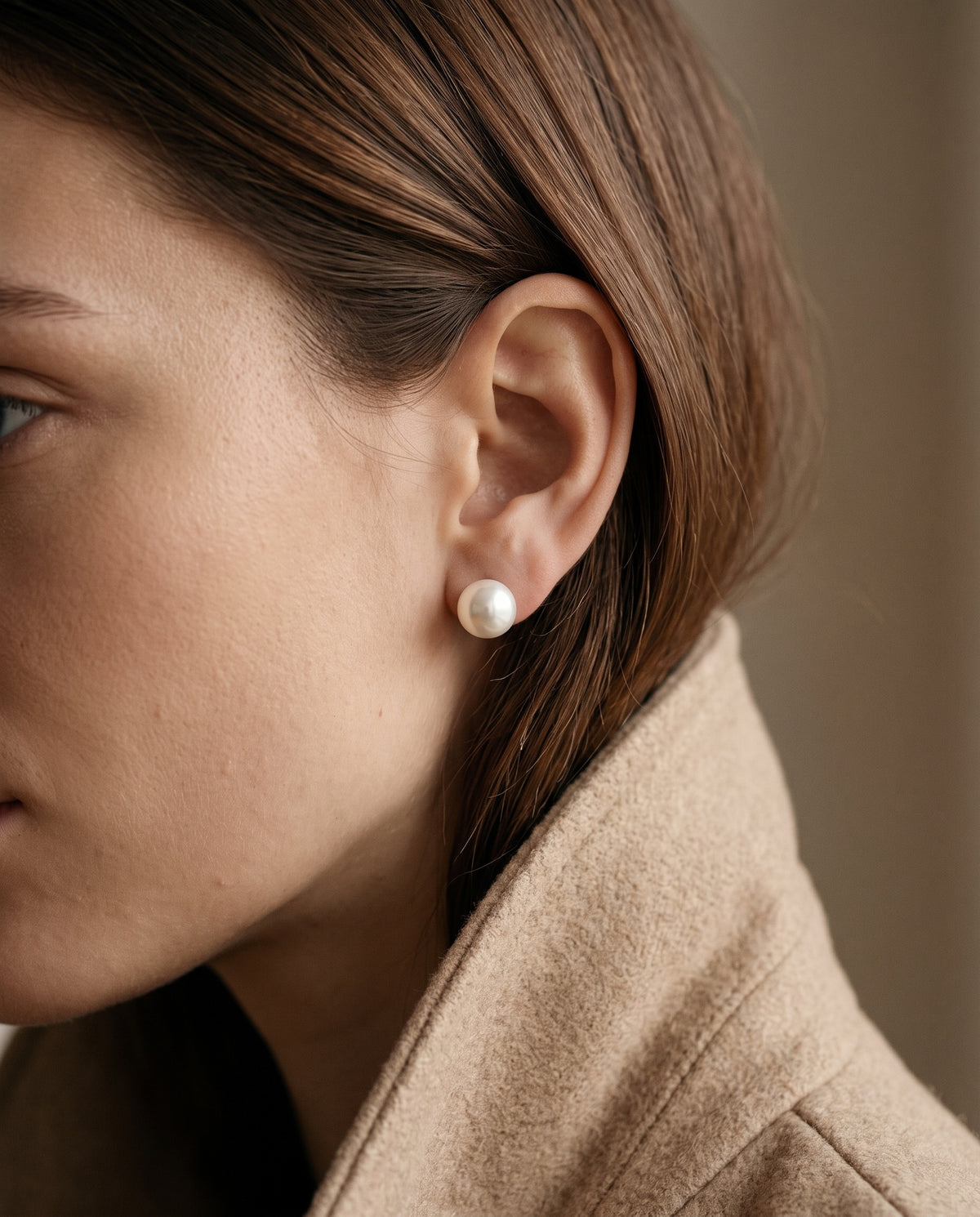 Sterling Silver Pearl Studs worn by a model